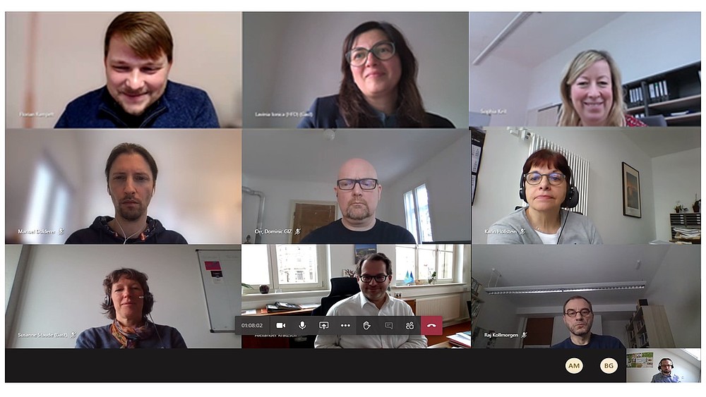Nine people in an online conference on the topic of digital universities.
