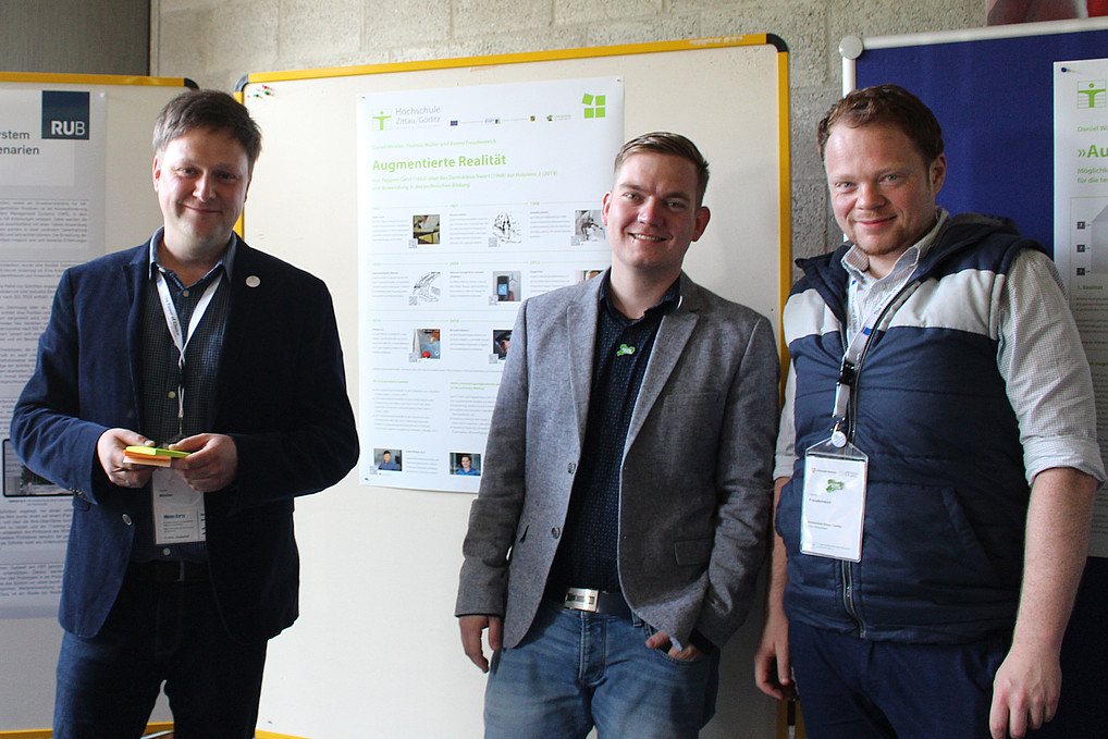 Daniel Winkler, Thomas Müller and Ronny Freudenreich on the poster session of the conference