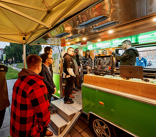 Guests enter the ZukLOS trailer.