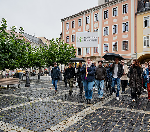 Students walk across the market.