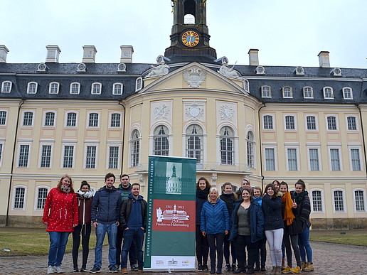 The HSZG student project group in front of Hubertusburg Castle in Wermsdorf