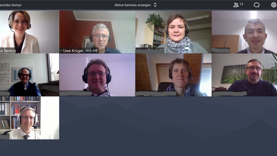 Screenshot of a video conference with nine participants