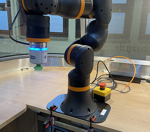 A technical test system is mounted on a table top in the trailer.