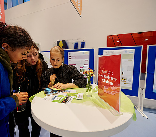 Students at the information table